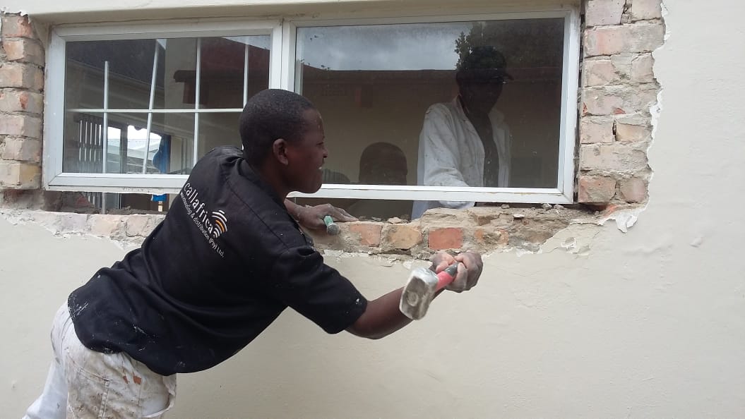 Window surround plastering and crack repair