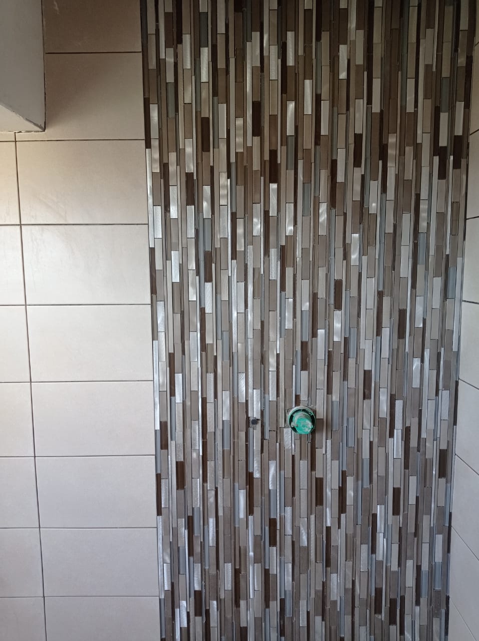 Mosaic bathroom wall tiling